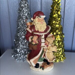 Festive Santa and Child Holiday Figurine